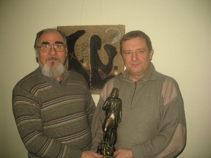 С румынским художником Аурелом Станчу.